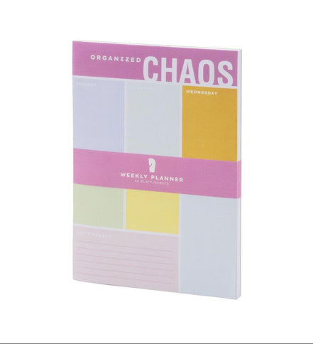 Weekly planner cartaceo con layout settimanale colorato

